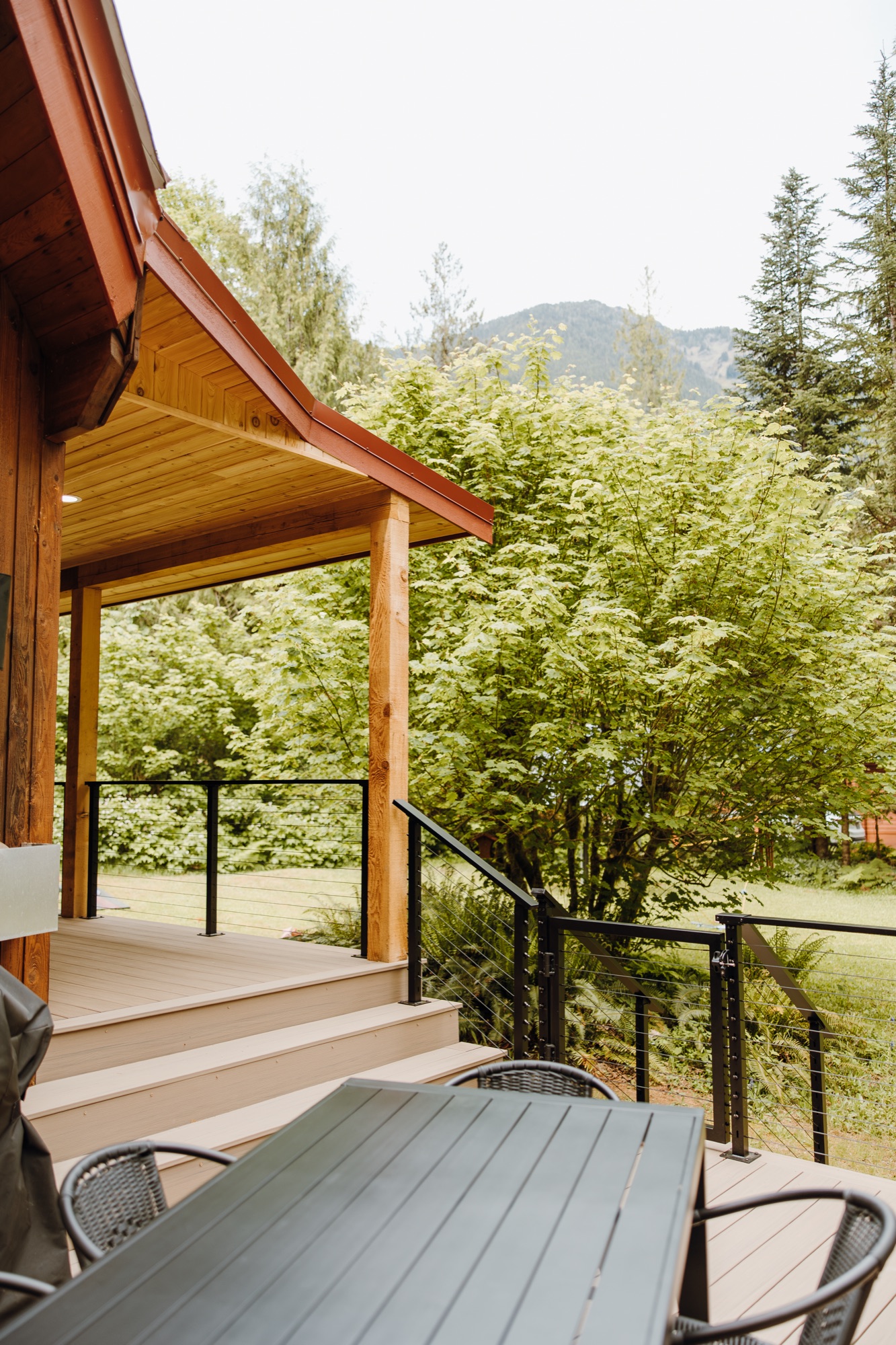 Covered deck with mountain views